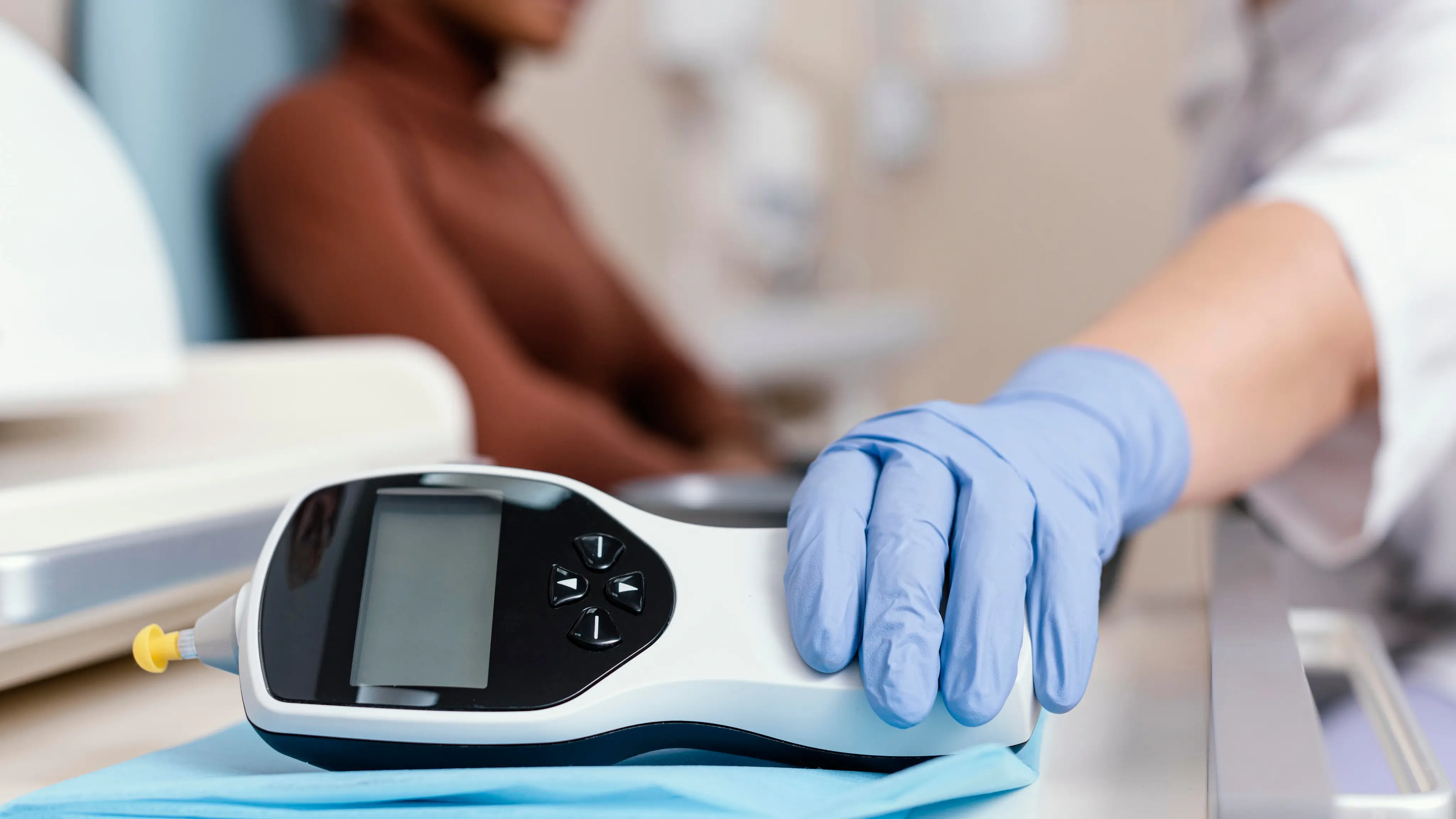 technician using infrared thermometer
